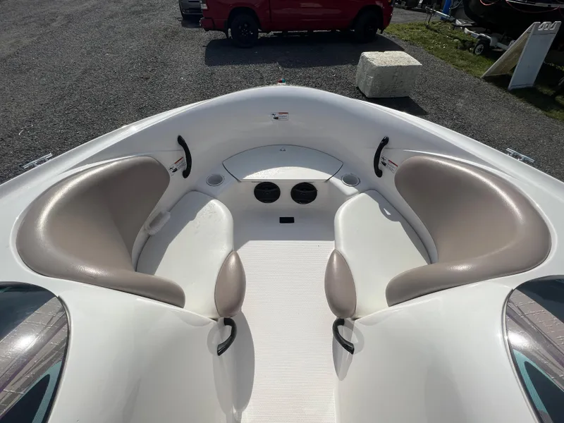 Slide: The Image of 2000 Yamaha Boats LS 2000 interior with seating and storage compartments. - 10