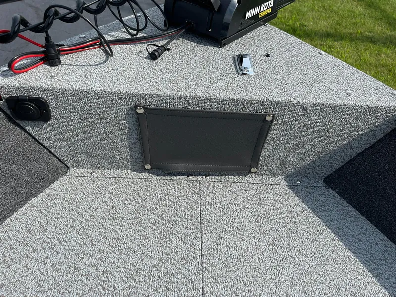 Slide: The Image of 2026 Lund 1650 Angler SS boat interior with Minn Kota Terrova motor. - 30