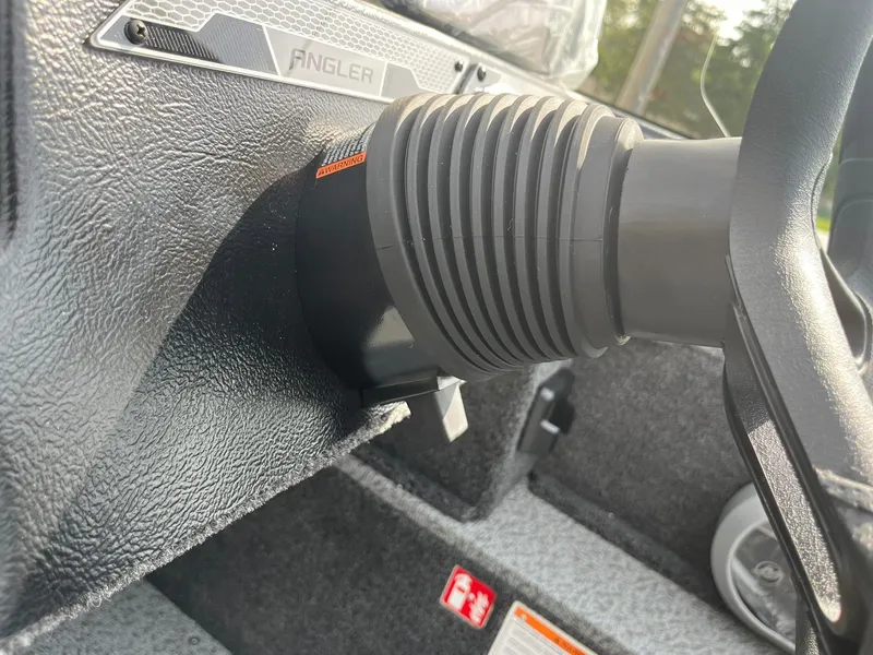 Slide: The Image of 2026 Lund 1650 Angler SS dashboard with steering wheel detail. - 33