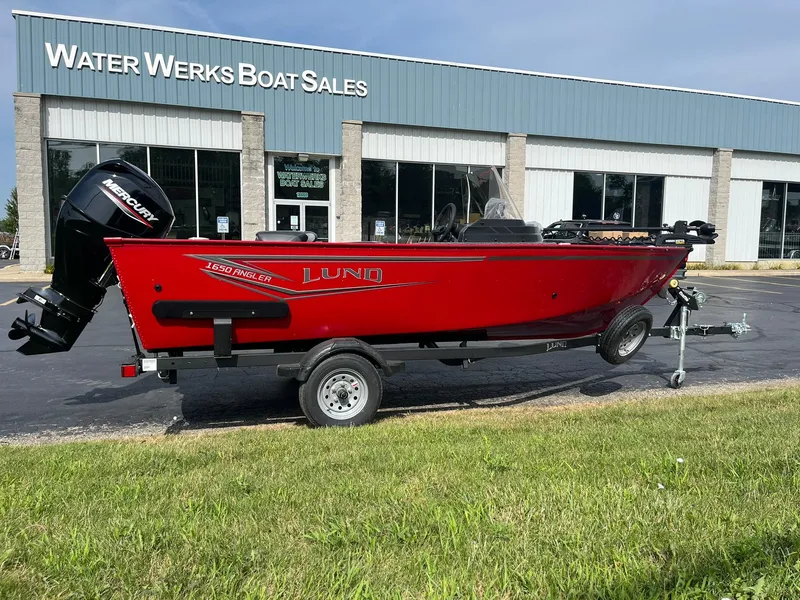 Slide: The Image of 2026 Lund 1650 Angler SS boat in red, parked at Water Werks Boat Sales. - 38