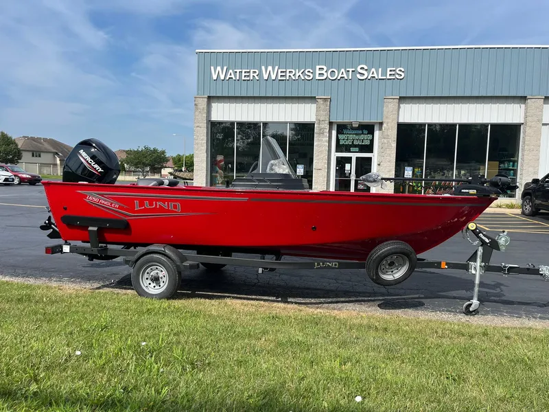 Slide: The Image of 2026 Lund 1650 Angler SS boat in red, parked at Water Werks Boat Sales. - 39