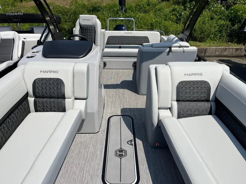 Slide: The Image of 2026 Harris Solstice 250 boat interior with luxurious seating and modern design. - 7