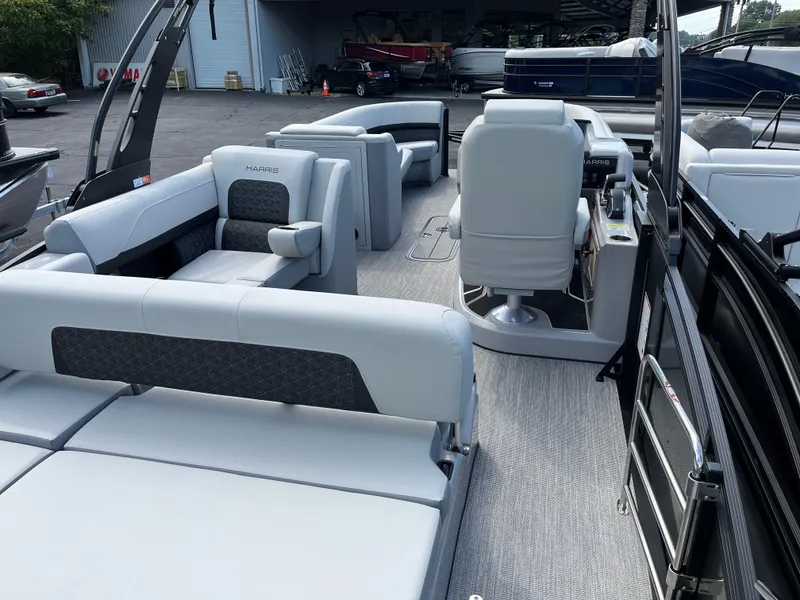 Slide: The Image of 2026 Harris Solstice 250 pontoon boat interior with luxurious seating and modern design. - 8
