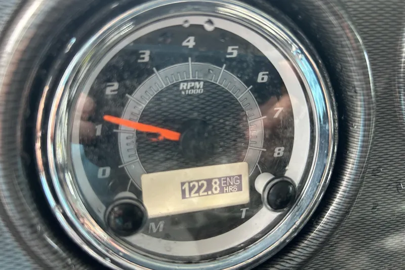 Slide: The Image of Close-up of 2013 Yamaha Boats 212 X tachometer showing 122.8 engine hours. - 7