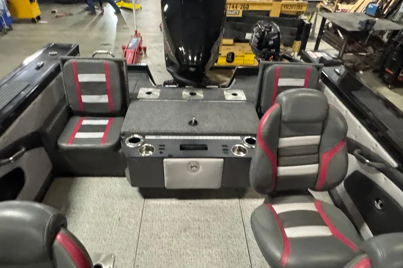 Slide: The Image of 2023 Ranger VX1888 WT boat interior with open storage compartments. - 16