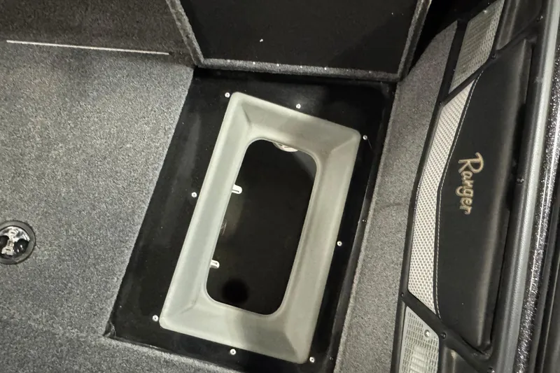 Slide: The Image of Interior of 2023 Ranger VX1888 WT boat showing storage compartments and fire extinguisher. - 20