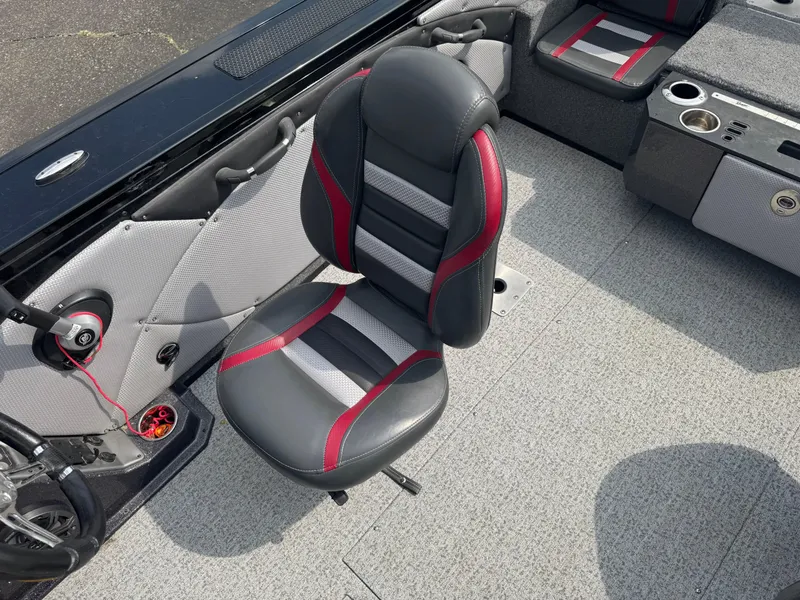 Slide: The Image of 2023 Ranger VX1888 WT boat dashboard with steering wheel and Humminbird navigation system. - 7