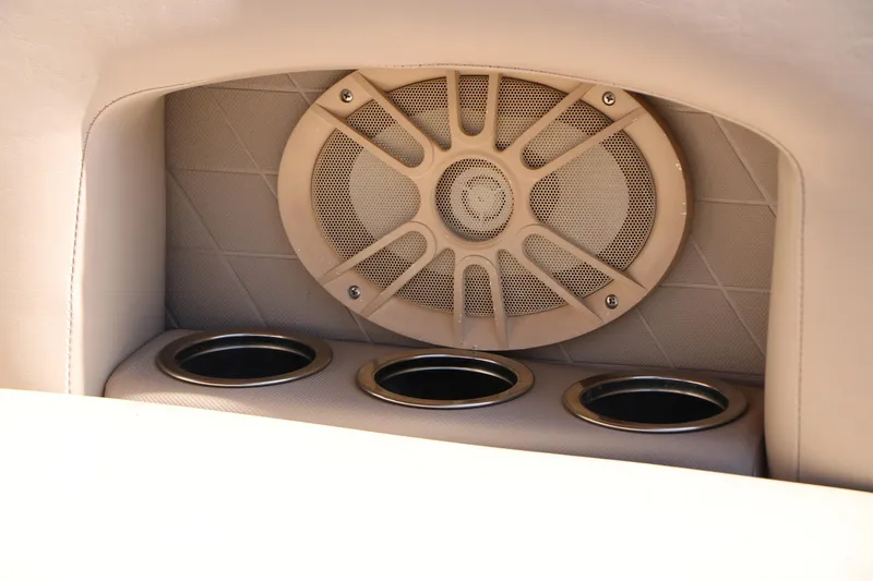 Slide: The Image of Dashboard of a 2013 Sylvan Mirage 8522 boat with steering wheel and gauges. - 23