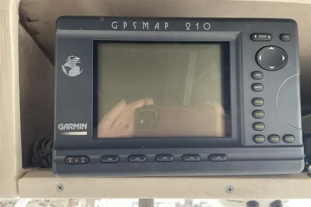 Slide: The Image of Garmin GPSMAP 210 on 1997 Grady-White Journey 258 boat dashboard. - 13