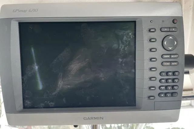 Slide: The Image of Garmin GPSmap 4210 on 1997 Grady-White Journey 258 boat, displaying navigation interface. - 14