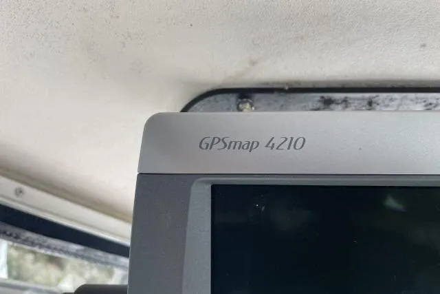Slide: The Image of GPSmap 4210 device on 1997 Grady-White Journey 258 boat dashboard. - 15