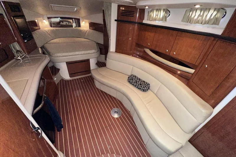Slide: The Image of Luxurious interior of 2007 Sea Ray 320 Sundancer yacht with elegant seating and wood finishes. - 24