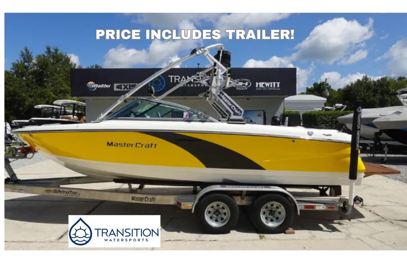 The Image of 2011 MasterCraft X-15 boat in yellow on trailer, available at Transition Watersports. - 0
