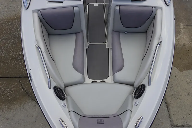Slide: The Image of 2011 MasterCraft X15 boat interior with gray seating and sleek design. - 22