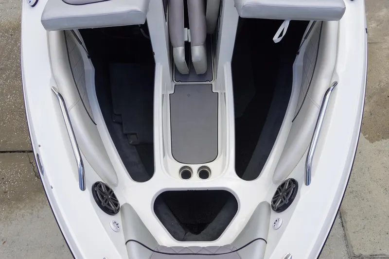 Slide: The Image of 2011 MasterCraft X15 boat interior with gray seating and sleek design. - 24