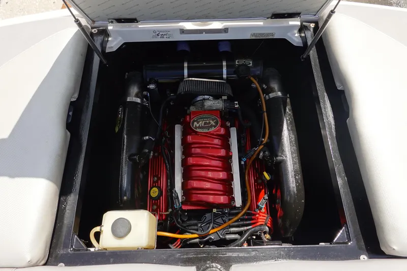 Slide: The Image of 2011 MasterCraft X15 engine compartment with red MCX Vortec engine. - 29