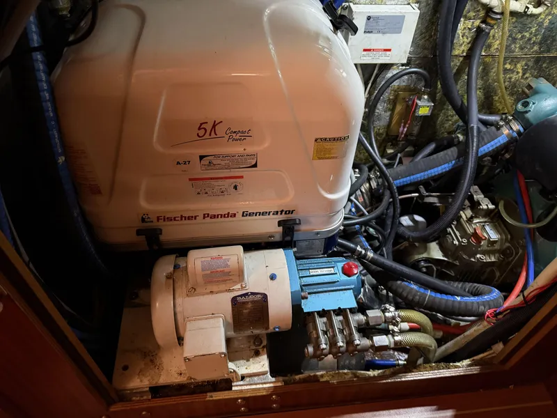 Slide: The Image of Engine room of a 2003 Bavaria 44 Ocean with Fischer Panda generator. - 6
