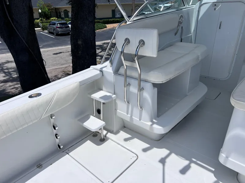 Slide: The Image of 1999 Glacier Bay 2670 Island Runner boat interior with seating and steps. - 18