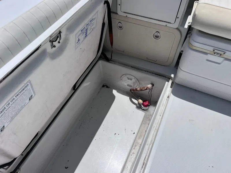 Slide: The Image of Open storage compartment on a 1999 Glacier Bay 2670 Island Runner boat. - 19