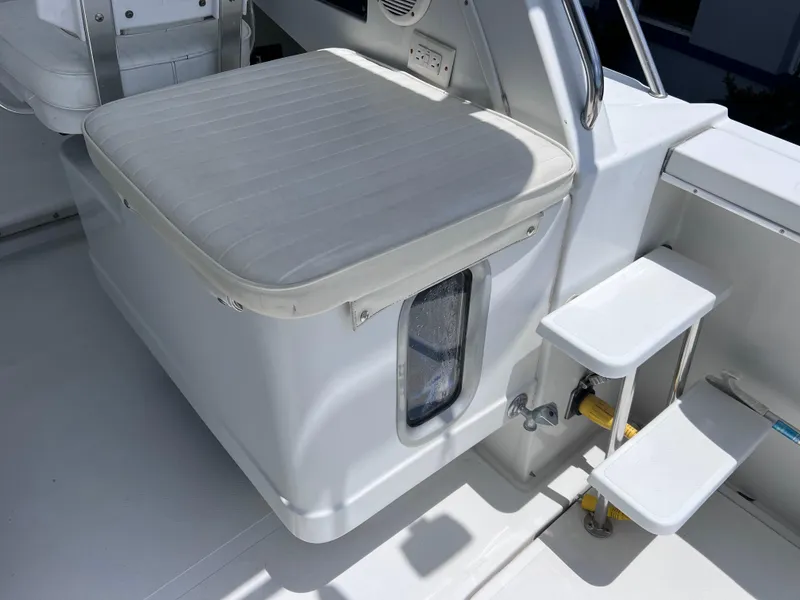 Slide: The Image of 1999 Glacier Bay 2670 Island Runner boat seating and steps detail. - 23