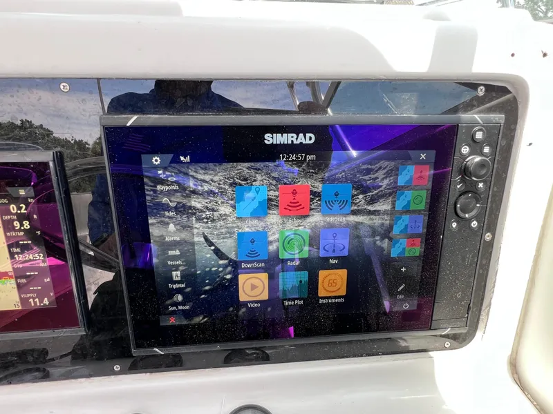 Slide: The Image of Simrad navigation display on 1999 Glacier Bay 2670 Island Runner boat dashboard. - 30