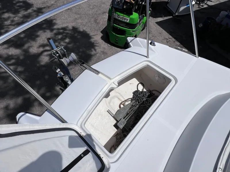 Slide: The Image of Anchor storage compartment on 1999 Glacier Bay 2670 Island Runner boat. - 36