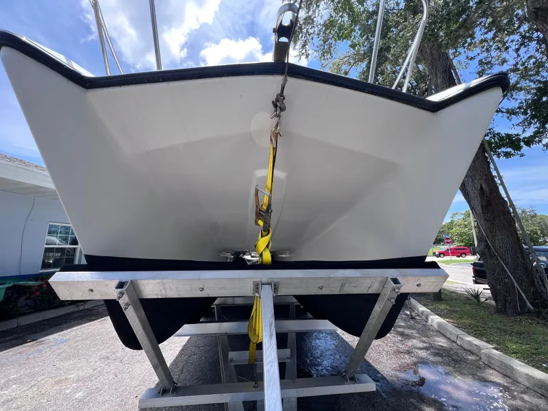 Slide: The Image of 1999 Glacier Bay 2670 Island Runner boat on trailer, viewed from the front. - 4