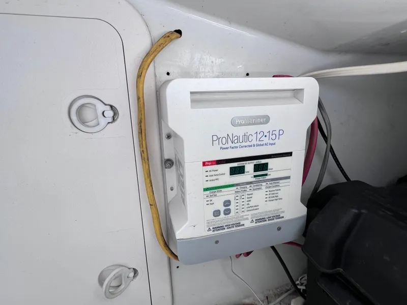 Slide: The Image of ProNautic 12:15P charger installed on 1999 Glacier Bay 2670 Island Runner boat. - 44