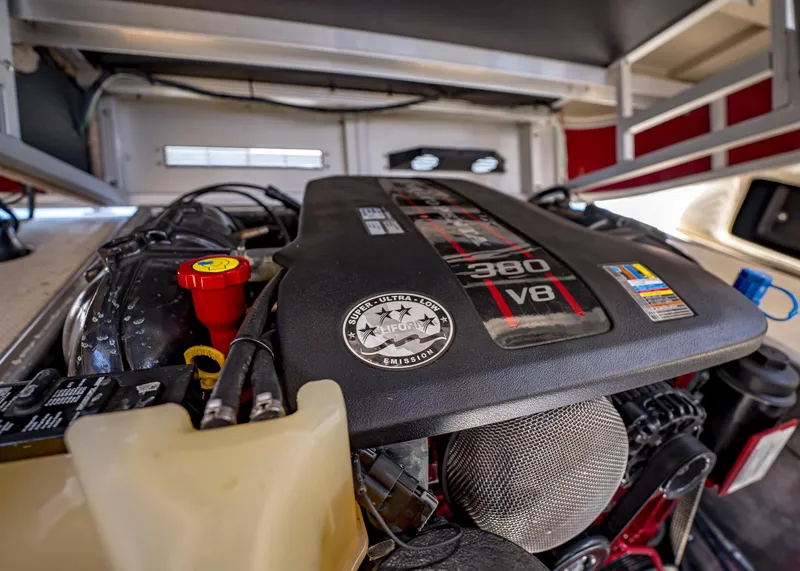 Slide: The Image of Engine of a 2015 Bennington Q28 boat, featuring a 380 V8 motor. - 15