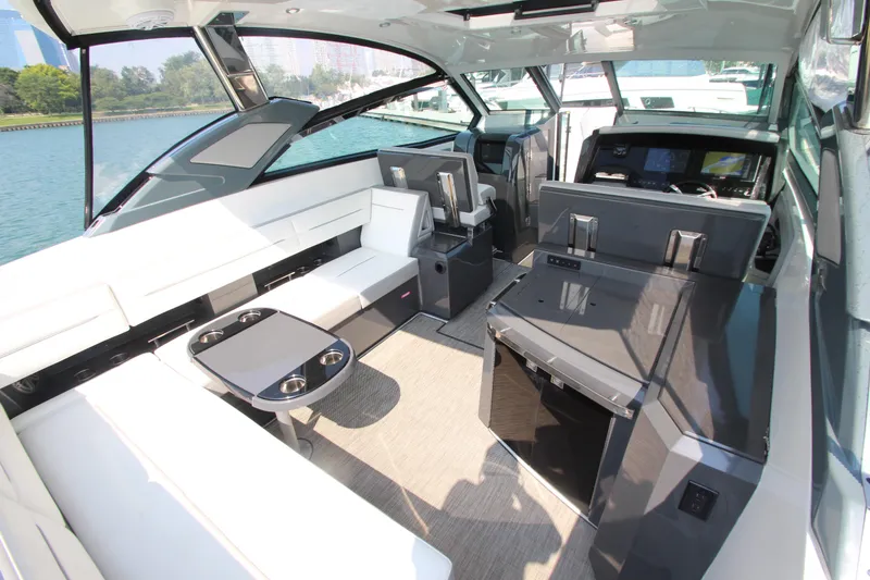 Slide: The Image of Luxurious interior of a 2018 Cobalt A36 boat with modern seating and sleek design. - 36