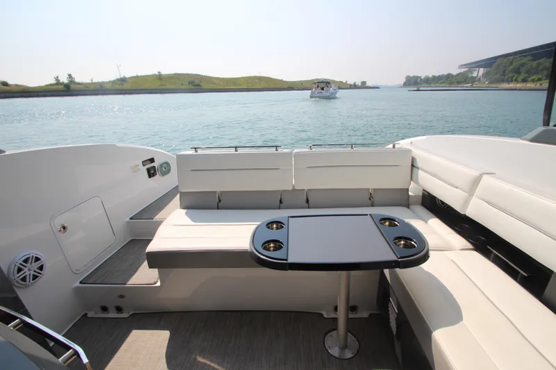 Slide: The Image of Luxurious seating area on a 2018 Cobalt A36 boat with scenic water view. - 39