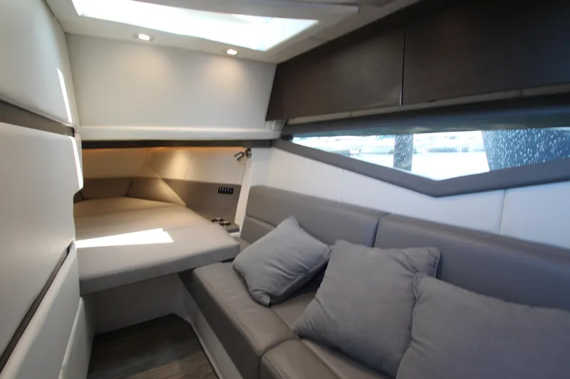 Slide: The Image of Luxurious interior of 2018 Cobalt A36 yacht with modern seating and ambient lighting. - 44