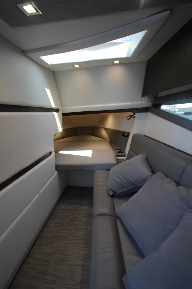 Slide: The Image of Interior of 2018 Cobalt A36 yacht, featuring modern design with cozy seating and skylight. - 45