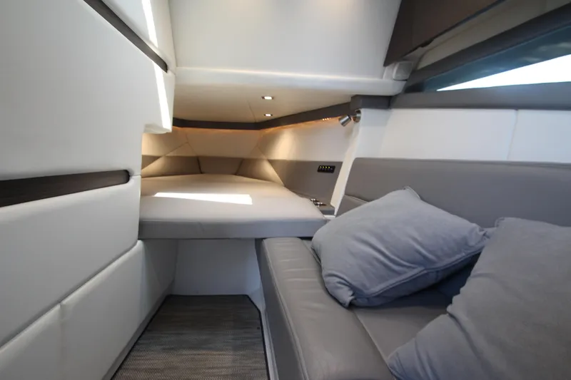 Slide: The Image of Luxurious interior cabin of 2018 Cobalt A36 boat with plush seating and modern design. - 46