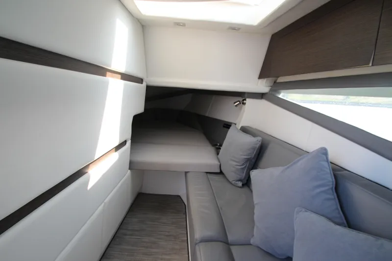 Slide: The Image of Interior of 2018 Cobalt A36 yacht with modern seating and bedding. - 47
