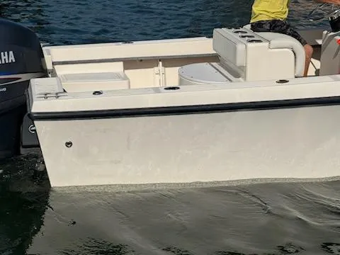 Slide: The Image of 2007 May-Craft 2000 boat on water with Yamaha outboard motor. - 2