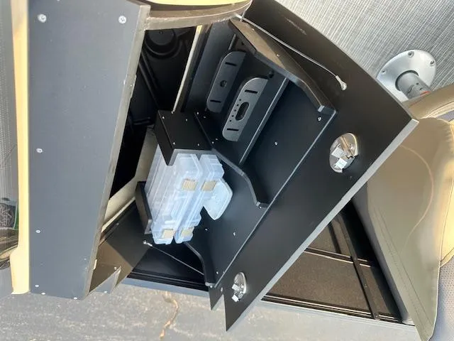 Slide: The Image of 2025 Viaggio Lago X-F interior storage compartment with modern design and utility features. - 19