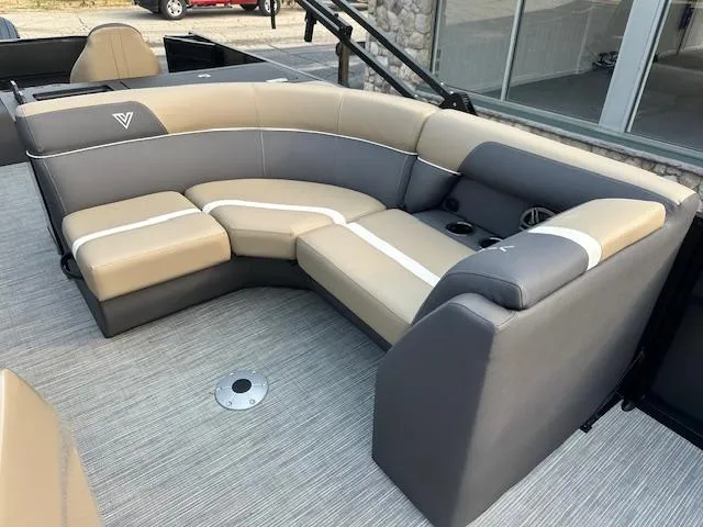Slide: The Image of 2025 Viaggio Lago X-F boat interior with beige and gray seating. - 23
