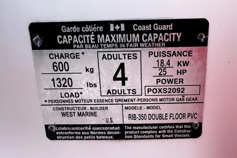 Slide: The Image of West Marine RIB-350 capacity plate, 2022 model, 4 adults, 600 kg load, 25 HP power. - 8