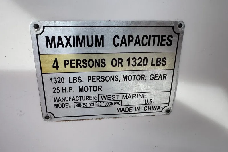 Slide: The Image of Capacity plate for 2022 West Marine RIB-350, 4 persons or 1320 lbs, 25 HP motor. - 9