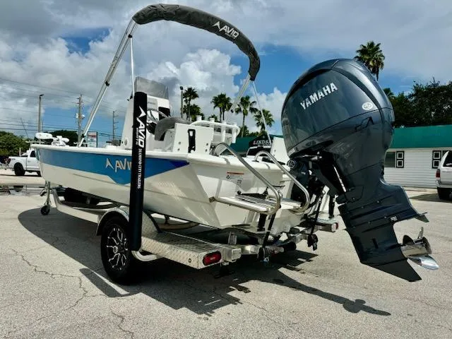 Slide: The Image of Avid 21 Mag 2025 boat with Yamaha outboard motor on trailer. - 3