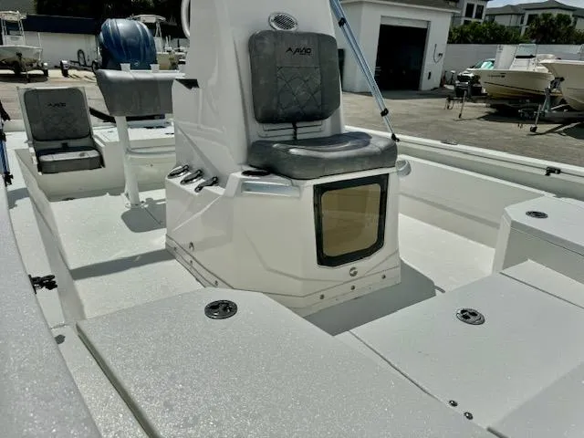 Slide: The Image of Avid 21 Mag 2025 boat interior with seating and storage compartments. - 9