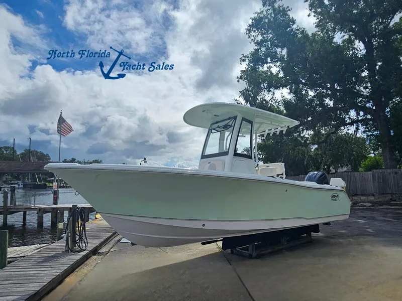 The Image of 2026 Sea Hunt Ultra 235 SE boat at North Florida Yacht Sales dock. - 0