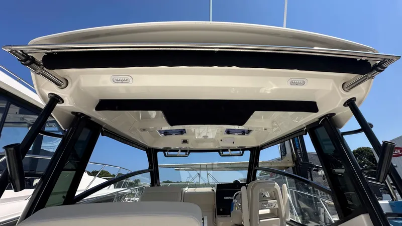 Slide: The Image of 2026 Boston Whaler 325 Conquest boat interior, showcasing sleek design and modern features. - 24