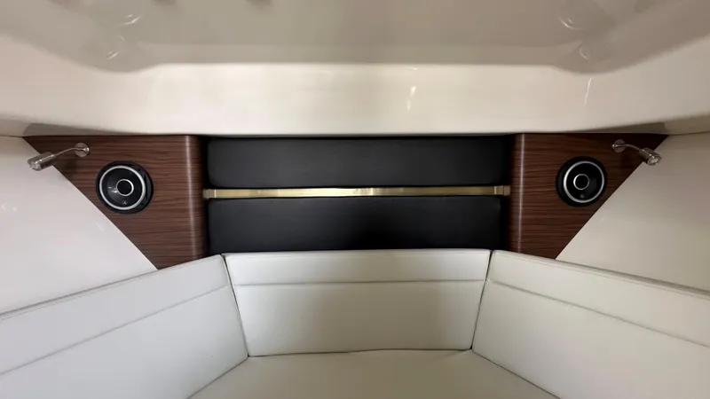 Slide: The Image of Interior seating of 2026 Boston Whaler 325 Conquest with modern design and wood accents. - 41