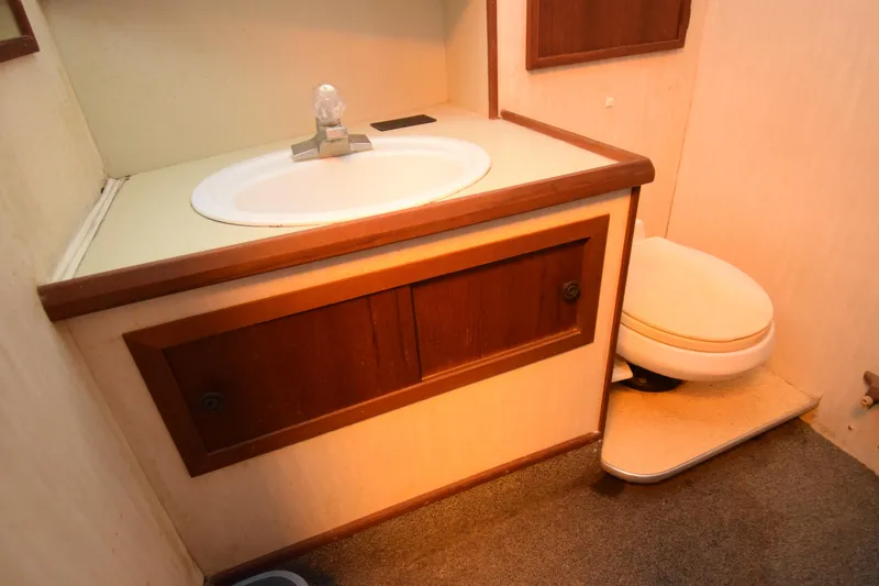 Slide: The Image of Bathroom interior of 1977 Uniflite 42 Double Cabin with sink and toilet. - 8