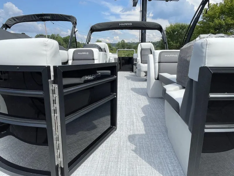 Slide: The Image of 2026 Harris Cruiser 230 pontoon boat interior with modern seating and sleek design. - 4