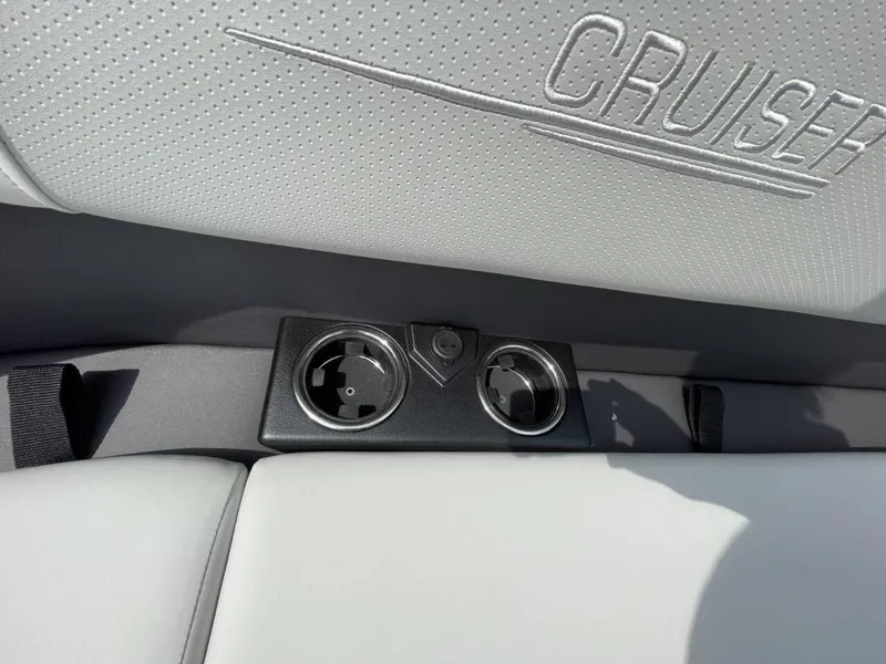 Slide: The Image of 2026 Harris Cruiser 230 interior with cup holders and embossed seat design. - 6