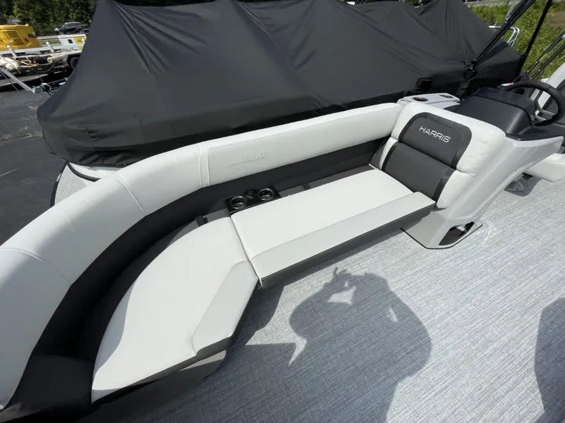 Slide: The Image of 2026 Harris Cruiser 230 boat interior with sleek seating and modern design. - 8