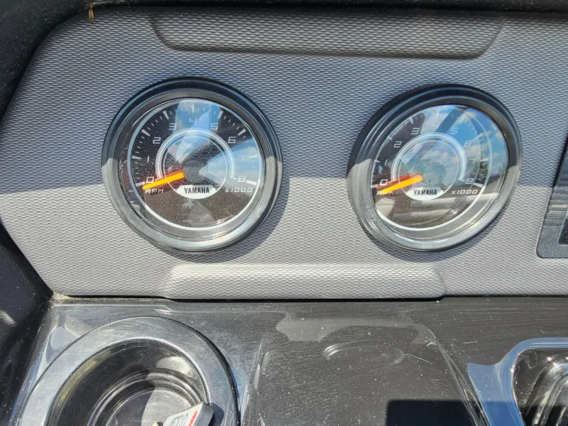 Slide: The Image of Dashboard of a 2017 Yamaha Boats SX210 showing RPM gauges. - 16